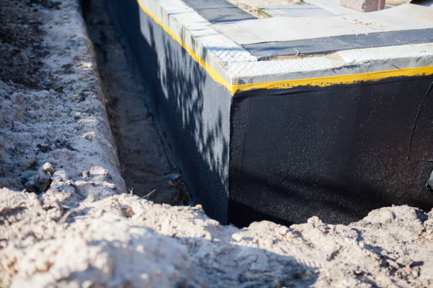 Professional Waterproofing technician working in Montgomery, IL
